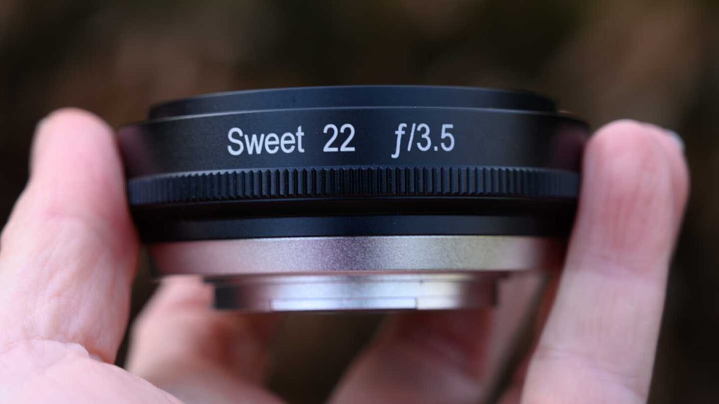 Lensbaby Sweet 22 showing the lens in a hand